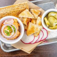 Obatzda (Bavarian Beer Cheese Spread) · Vegetarian. Camembert, cream cheese, Colorado's own sawatch butter and beer, served with rad...