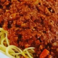 Spaghetti Bolognese · Creamy meat sauce with beef and pork.