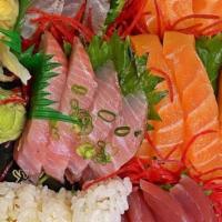 Sashimi Deluxe · 20 pcs sashimi (sushi chef's choice). Served with soup, salad, and steamed rice.