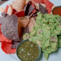 Guacamole · Fresh, chunky avocado, salsa and tortilla chips or fresh veggie sticks.