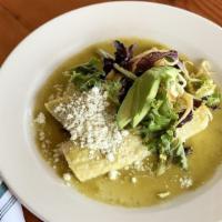 Verde Enchiladas · Soft corn tortillas filled with a choice of chicken, pork or veggies and topped with our bri...