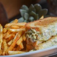 Spinach And Artichoke Un-Dipt · Mozzarella, Parmesan Cheeses, Artichokes, Baby Spinach, Water Chestnuts. Served on a Toasted...