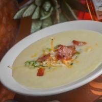 Cup Of Potato Soup · Homemade Baked Potato Soup, Sherry Cream, Topped with Cheddar Cheese, Scallions and Bacon