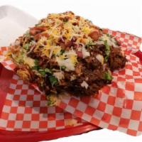 Volcano Tots · Tater Tots, Carnitas, BBQ sauce, bacon, sour cream, guacamole, cheese, chipotle sauce, onion...