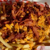 Chipotle Fries · Grilled Chicken, Chipotle Sauce  and Bacon