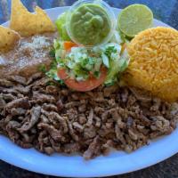 Carne Asada Plate · Carne Asada serves with Guacamole, Lettuce, Mexican Salsa (Pico), and a choice of Tortillas