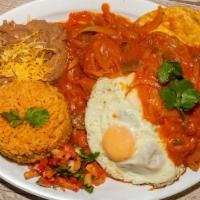Huevos A La Mexicana · tomatos, onion, cilantro egg scrambled