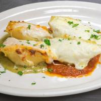 Stuffed Shells Duo · Two sweet potatoes, butternut squash, and haystack goat cheese served with pesto cream sauce...
