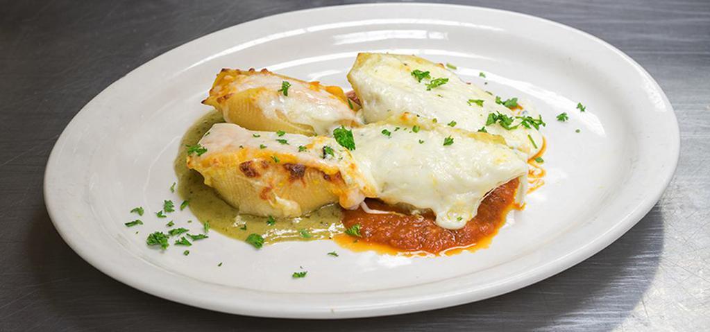 Stuffed Shells Duo · Two sweet potatoes, butternut squash, and haystack goat cheese served with pesto cream sauce accompanied by two Italian six-cheese stuffed shells with marinara.