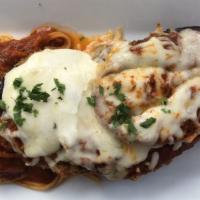 Eggplant Parmesan · Baked with Mozzarella cheese and served with spaghetti marinara.