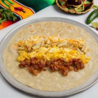 Breakfast Burrito · Two scrambled eggs served in a warm tortilla