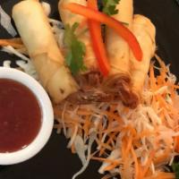 Spring Rolls (6) · Deep-fried wheat-flour wrapper filled with cabbage, carrot, vermicelli, and onion, served wi...