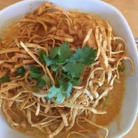 Kao Soy (Curry Noodle) · Egg noodle and your choice of meat or tofu in northern Thai style curry with pickled vegetab...