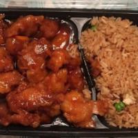 Orange Chicken · Battered and deep-fried strips of chicken breast, sautéed in sweet and sour sauce.