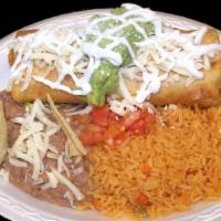 #4 Chimichanga · Choose from: Beef or Chicken
W/ Lettuce, Tomato, Cheese, Guacamole & Sour Cream