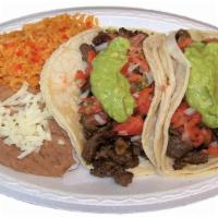 #8 Two Soft Tacos · Choose from: Carne Asada, Pollo Asado, Carnitas or Al-Pastor
W/ Guacamole & Pico de Gallo
Ex...
