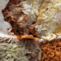 #21 Chilaquiles · Fried diced Corn Tortilla in Red Sauce w/ 2 Eggs on top & Sour Cream
How you would like your...