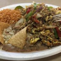 #17 Machaca & Eggs · Shredded Beef, Onions, Green and Red Bell peppers & Egg Scramble
Choose from 4 Corn Tortilla...