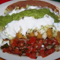 12 Rolled Tacos · Choose from: Beef or Chicken
W/ Guacamole, Lettuce, Tomato & Cheese