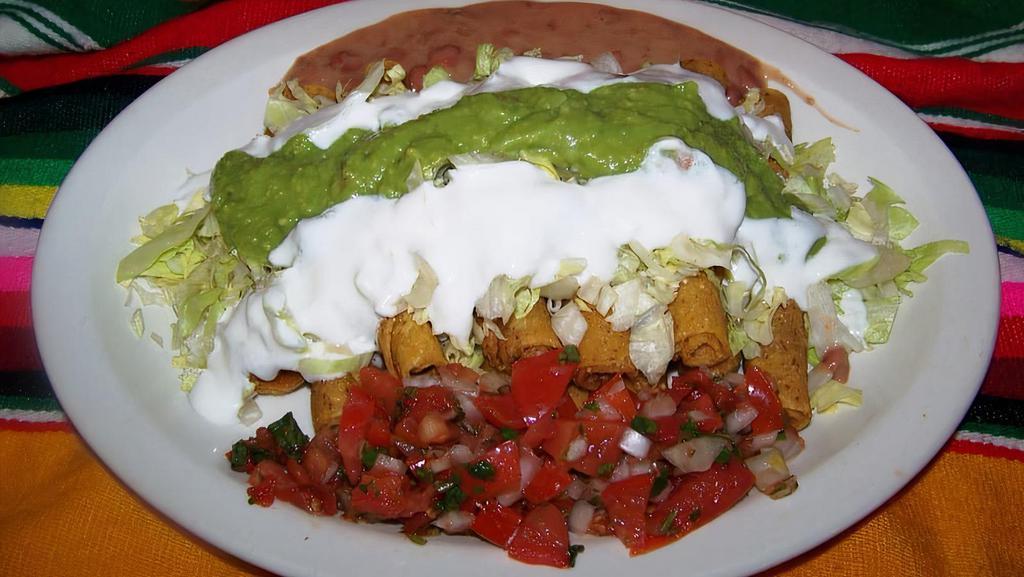 5 Rolled Tacos · Choose from: Beef or Chicken
W/ Guacamole, Lettuce, Cheese, Tomato