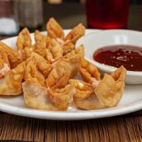 Crab Cheese Wonton · 6 Pieces.  Includes sweet and sour  sauce.