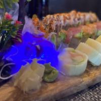 Naruto Roll · Salmon, crabnneat, avocado and shrimp wrapped with cucumber, served with ponzu sauce.

These...