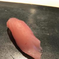 White Tuna Sushi · These items may be served raw by undercooked, or contain raw or undercooked ingredients. Con...