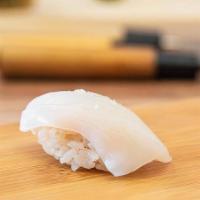 Squid Sushi · These items may be served raw by undercooked, or contain raw or undercooked ingredients. Con...