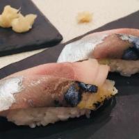 Mackerel Sushi · These items may be served raw by undercooked, or contain raw or undercooked ingredients. Con...