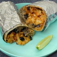 Burrito · Choice of protein, flour tortilla, rice, black beans, cheese and crema. Sorry, but our rice ...