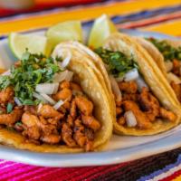 Taco Dinner · Dinner with three tacos of your choice of meat and toppings, accompanied with a side of rice...
