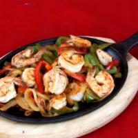 Shrimp Fajitas · Served with rice beans tortillas salads sour cream and guacamole.