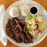 Short Rib Teriyaki · Served with white steamed rice and salad.