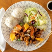 Orange Chicken · Served with white steamed rice and salad.