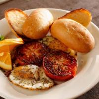 Eggs Provencal Breakfast · Local tomatoes, sautéed with fresh garlic, thyme and farm eggs, served with your choice of t...