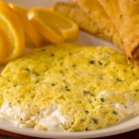 Fresh Herb & Goat Cheese Omelette Breakfast · French goat cheese and fine herbs. Made with three large farm fresh eggs and toast, with you...