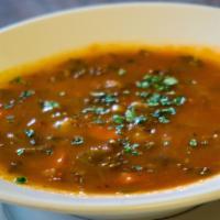 Vegetable Soup · A delicious vegan medley of vegetables sautéed together and served in an herbed tomato broth.