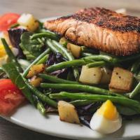 Wild Salmon French Farmer Salade · Wild salmon cooked to your liking (marinated, thyme crusted or blackened), warm haricot vert...
