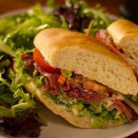 Le Boeuf Sandwich (Roast Beef) · Oven-roasted prime beef, local tomato, leaf lettuce, onion, extra spicy dijon, mayo and crea...