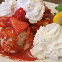 Fresh Strawberry Shortcake · Covered with fresh strawberry coulis and whipped cream.