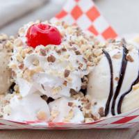 Banana Split · 3 scoops ice cream! whipped cream, cherry, nuts and fudge or caramel.