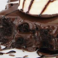 Hot Brownie Sundae · 1 scoop ice cream, 2 brownies, whipped cream, and fudge or caramel.