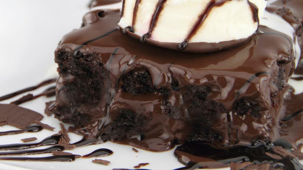 Hot Brownie Sundae · 1 scoop ice cream, 2 brownies, whipped cream, and fudge or caramel.