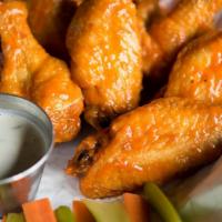 Hot Wings · Traditional Buffalo Wings served with blue cheese or ranch dressing