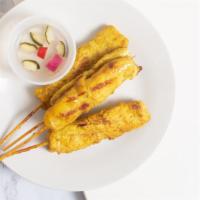 Chicken Satay (5 Pieces) · Grilled chicken breast marinated with curry powder, coconut milk, served with peanut sauce.
