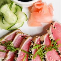 Rare Seared Ahi Tuna · Pickled cucumber, sesame seed,, wasabi cream, pickled ginger, soy sauce.

*Consuming raw or ...