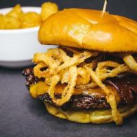 Whiskey Burger · house grind, whiskey glaze, fried onions, cheddar cheese, bacon, challah bun