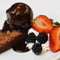 Heath Bar Brownie · Heath bar brownie topped with chocolate chunk ice cream.