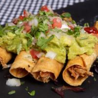 Flautas · 3 corn tortillas filled with shredded beef or chicken topped with tomatillo salsa, lettuce, ...