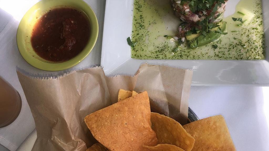 Ceviche* · Gluten - free. Seafood marinated in lime juice, mixed with serrano peppers, onions, tomatoes, and cilantro. Your choice of fish, shrimp or mixed.